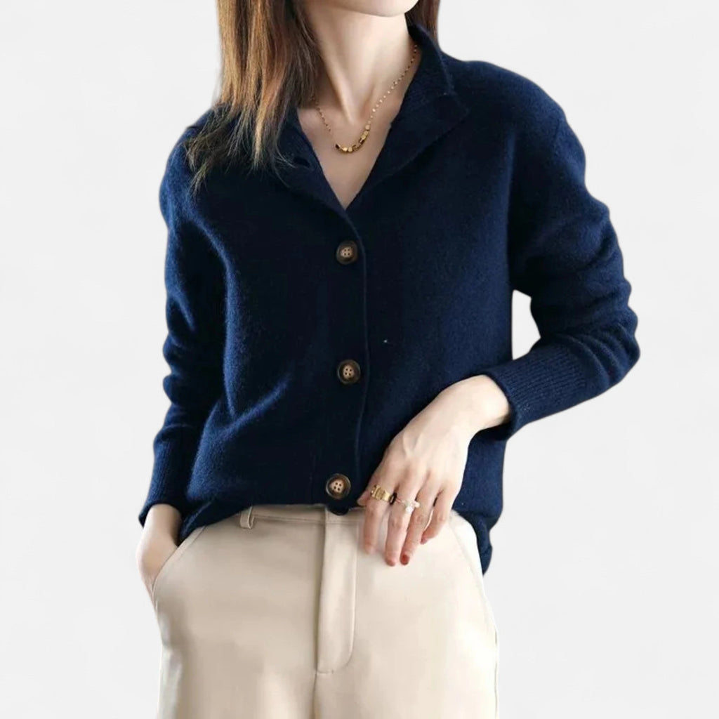 Driftly knit stand-collar short coat in navy blue, worn by model