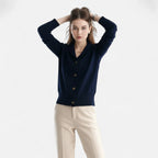 Driftly knit stand-collar short coat in navy blue, side view