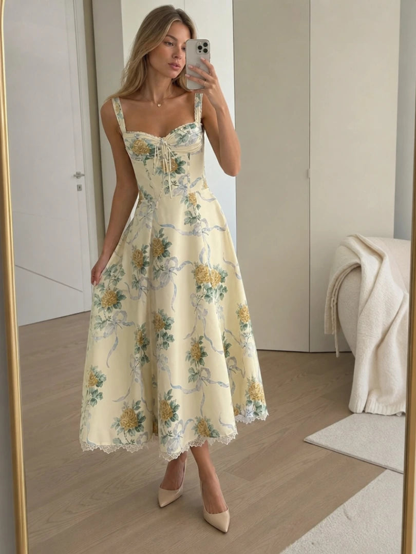 Woman wearing a beige corset style structured bodice midi dress - studio photo