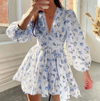 Woman wearing a blue crochet lace balloon sleeve mini dress - outdoor lifestyle photo