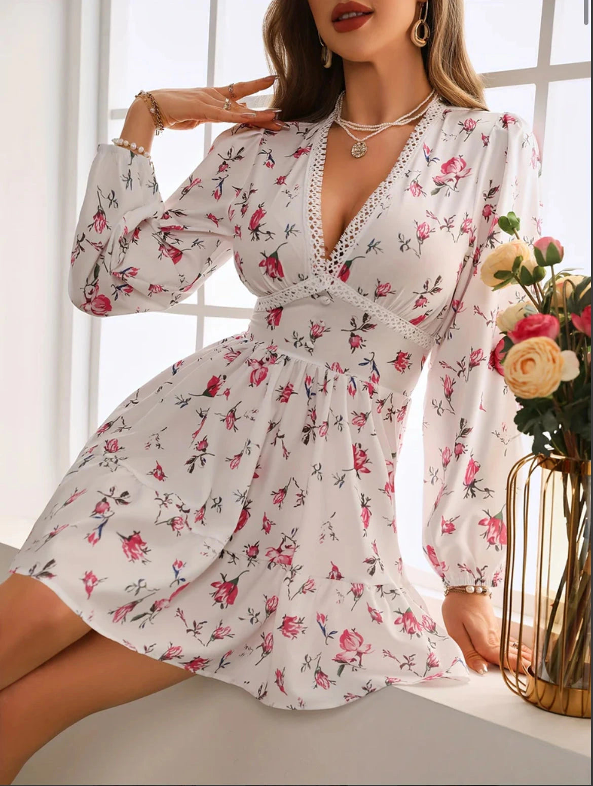 Woman wearing a pink crochet lace balloon sleeve mini dress - outdoor lifestyle photo