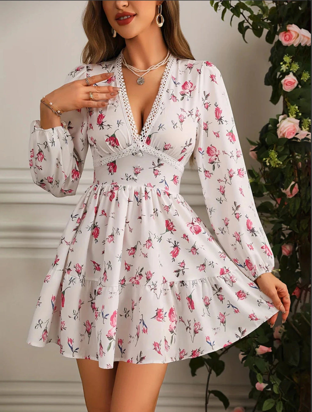 Woman wearing a pink crochet lace balloon sleeve mini dress - outdoor lifestyle photo