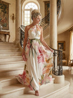Woman wearing a purple floral halter tie-neck maxi dress - editorial style photo