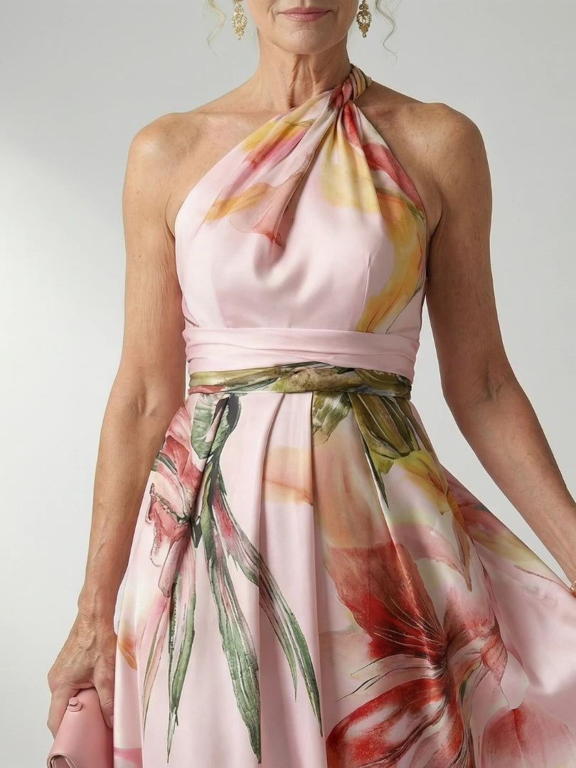 Woman wearing a white floral halter tie-neck maxi dress - editorial style photo