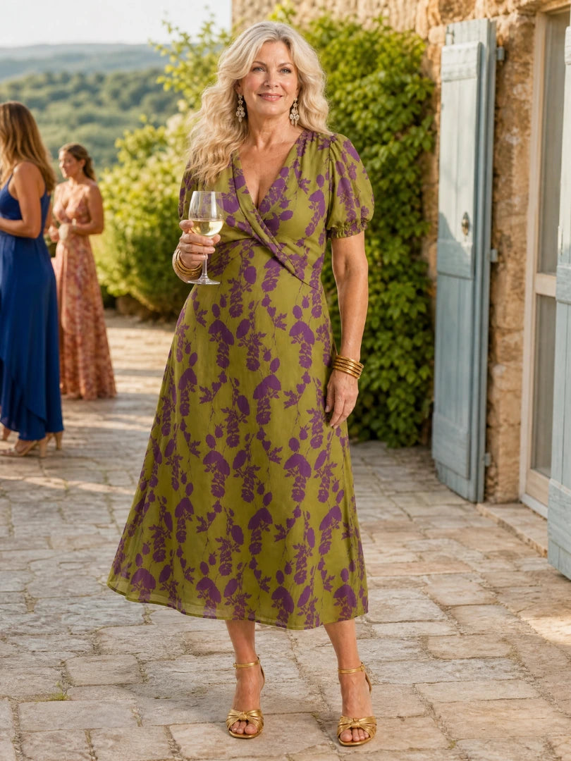 Woman wearing a floral relaxed midi dress - editorial style photo