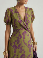 Woman wearing a floral relaxed midi dress - studio photo