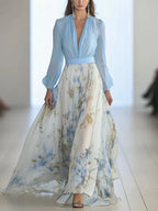 Woman wearing a sky blue floral sheer maxi dress - lifestyle photo