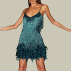 Woman wearing a blue fringe hem mini dress - studio photo
