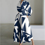 Woman wearing a rainbow polka front wrap collared maxi dress - lifestyle photo
