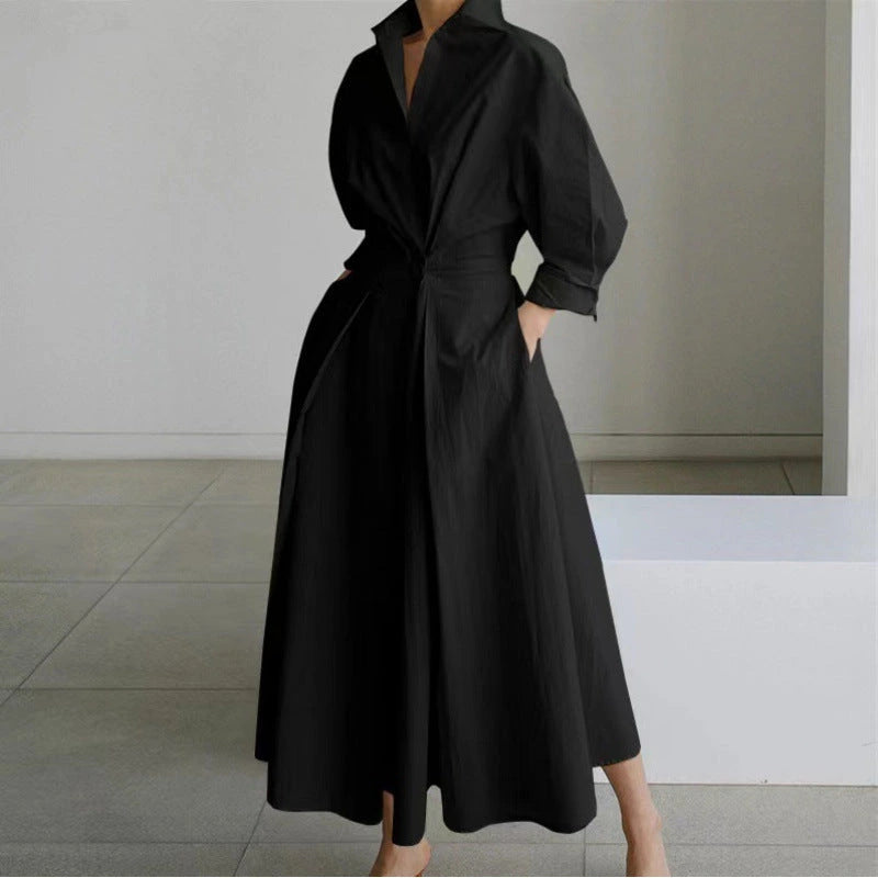 Woman wearing a white letter front wrap collared maxi dress - studio photo