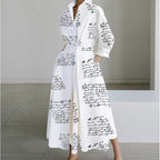 Woman wearing a white polka front wrap collared maxi dress - lifestyle photo