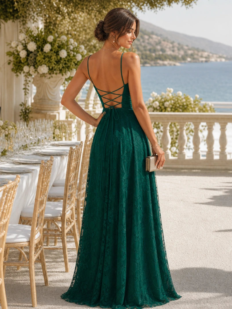 Woman wearing a dark green full lace spaghetti strap maxi dress - editorial style photo