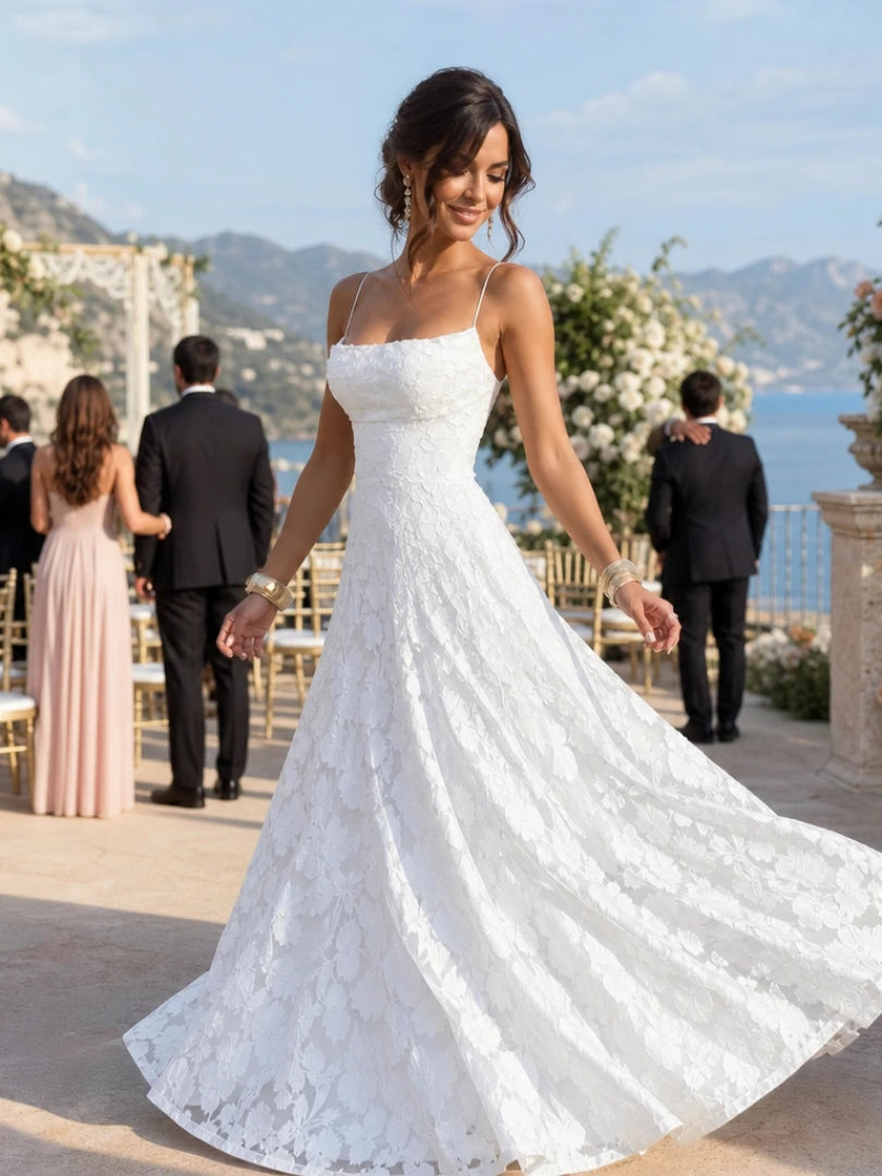 Woman wearing a white full lace spaghetti strap maxi dress - editorial style photo