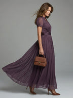 Woman wearing a purple gathered-waist keyhole maxi dress - outdoor lifestyle photo