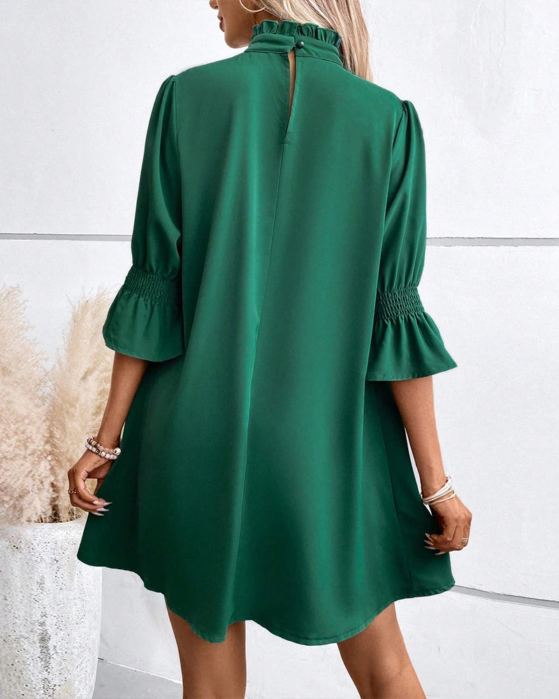 Driftly green high neck mini dress with ruffle sleeves, back view