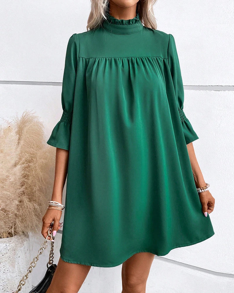Driftly green high neck mini dress with ruffle sleeves, side view