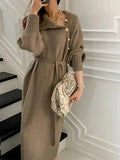 Khaki turtleneck sweater dress with tie waist, front view