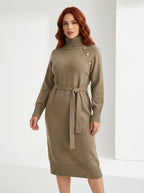 Khaki turtleneck sweater dress with tie waist on model, studio portrait