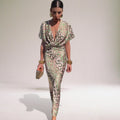 Woman wearing a multicolor knot front midi dress - editorial style photo