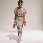 Woman wearing a multicolor knot front midi dress - editorial style photo