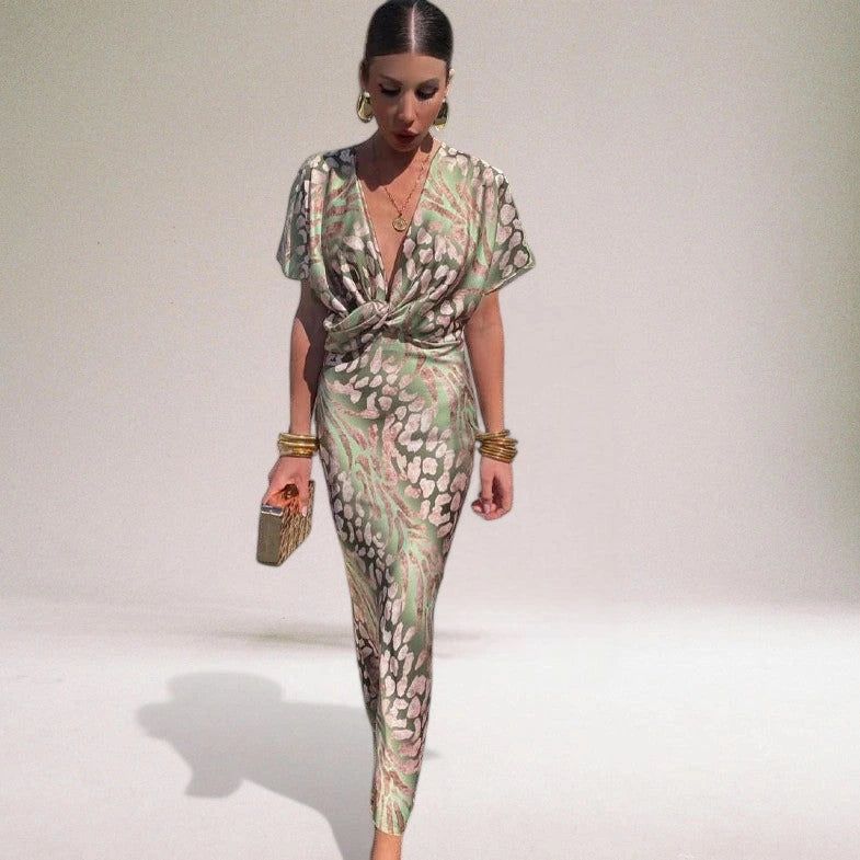 Woman wearing a multicolor knot front midi dress - editorial style photo