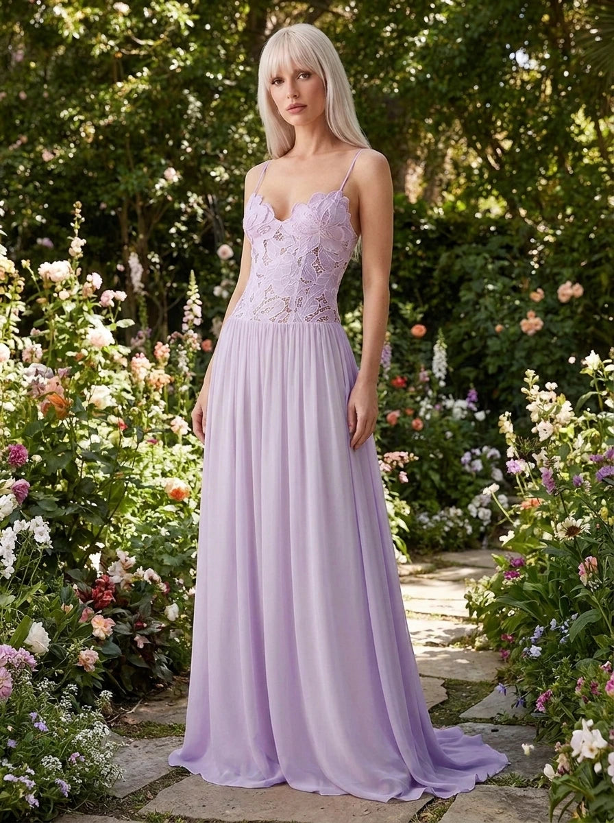 Woman wearing a lavender purple lace bustier maxi dress in a garden