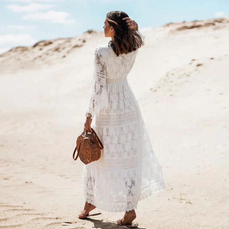 Woman wearing a beige lace long sleeve maxi dress - outdoor desert campaign style photo