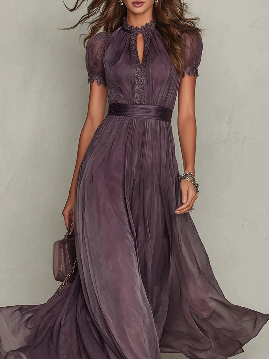 Woman wearing a purple lace trim gathered waist maxi dress - studio photo