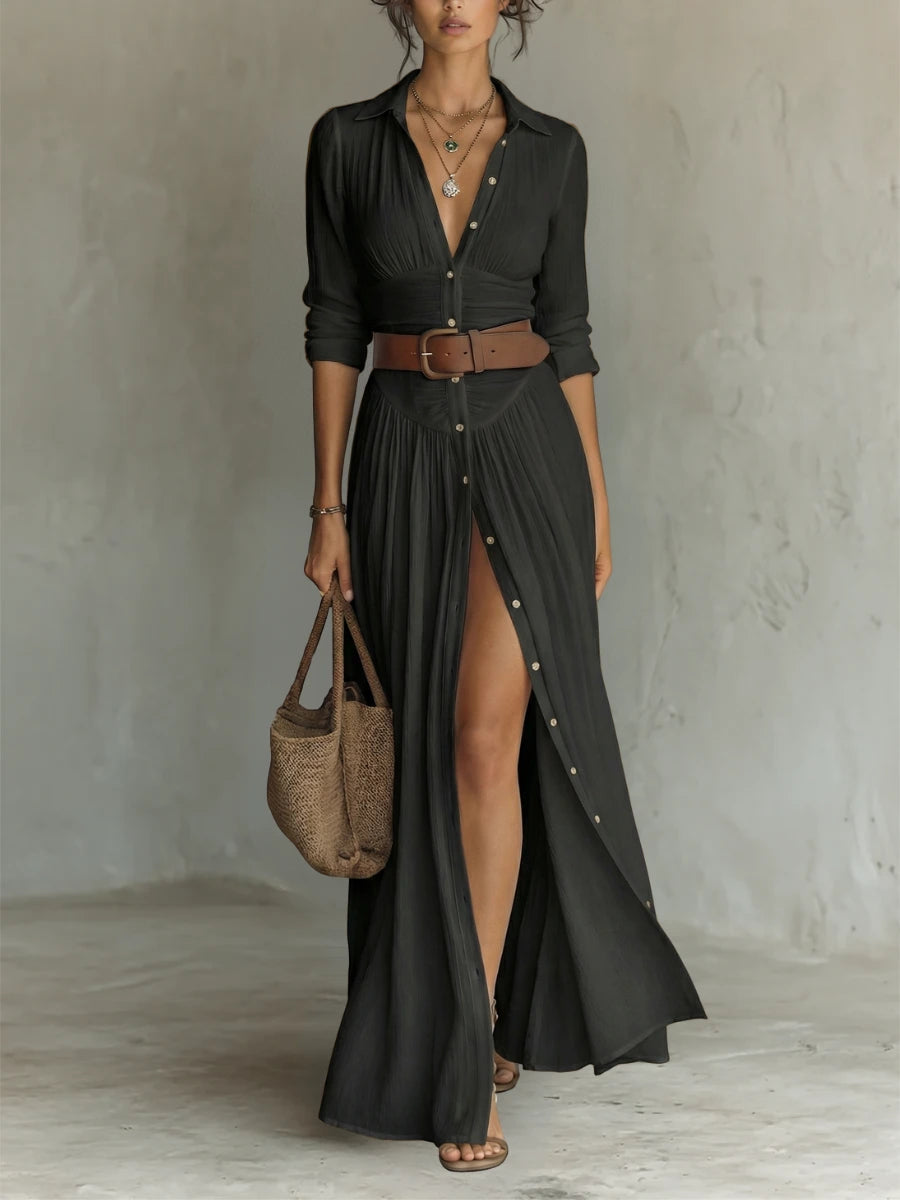 Woman wearing a black long sleeve collared dress - lifestyle photo
