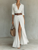 Woman wearing a white long sleeve collared dress - lifestyle photo