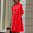 Woman wearing a red long sleeve midi dress - outdoor lifestyle photo