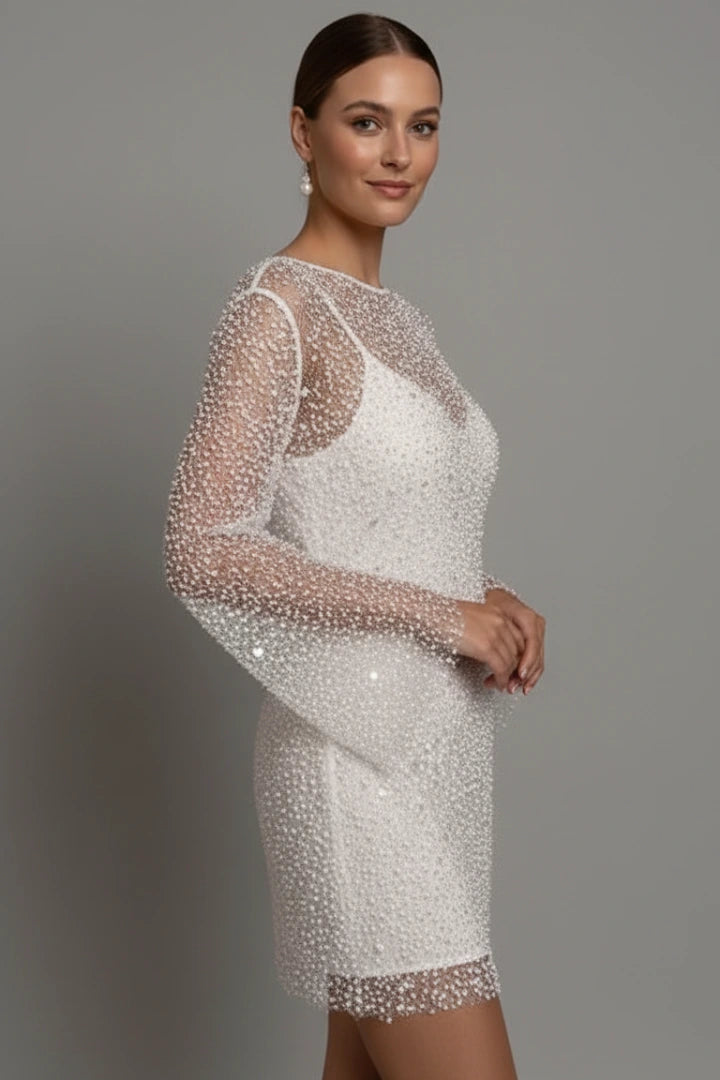 Woman wearing a white mesh overlay sleeveless mini dress - lifestyle photo