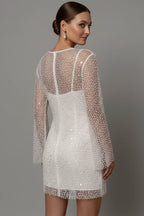 Woman wearing a white mesh overlay sleeveless mini dress - lifestyle photo
