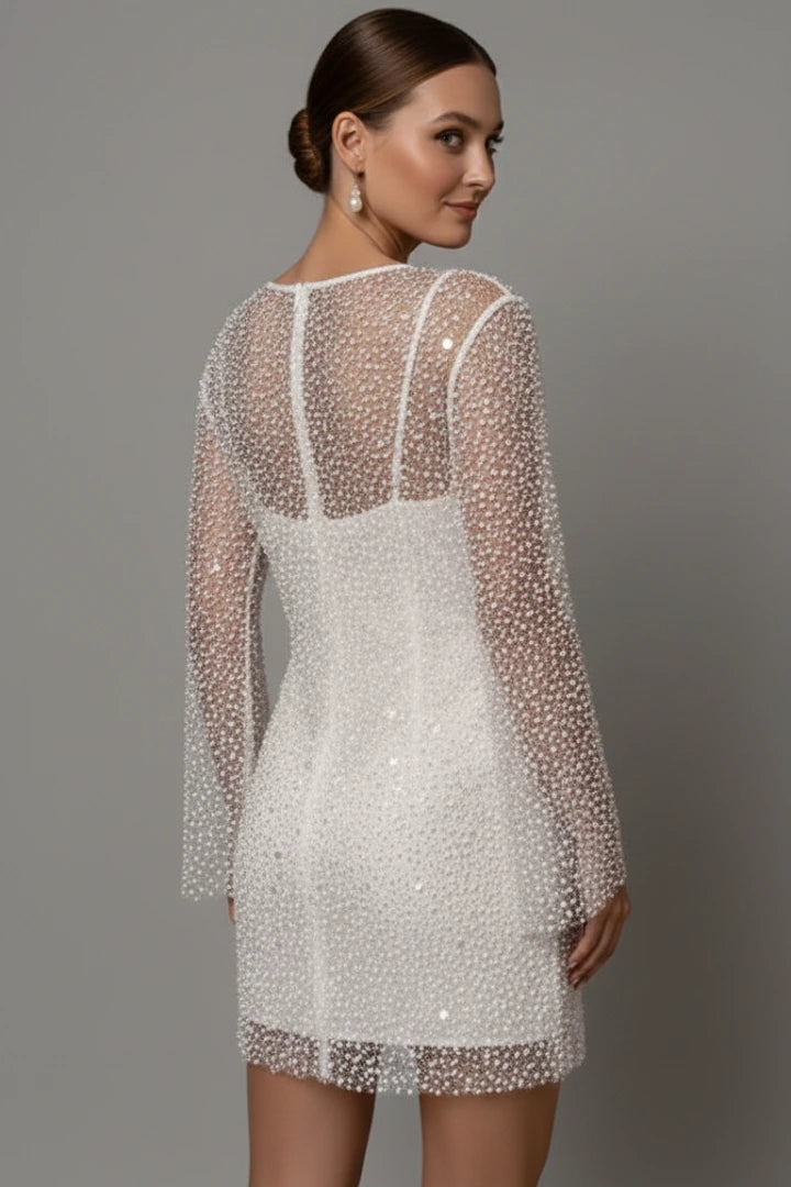 Woman wearing a white mesh overlay sleeveless mini dress - lifestyle photo