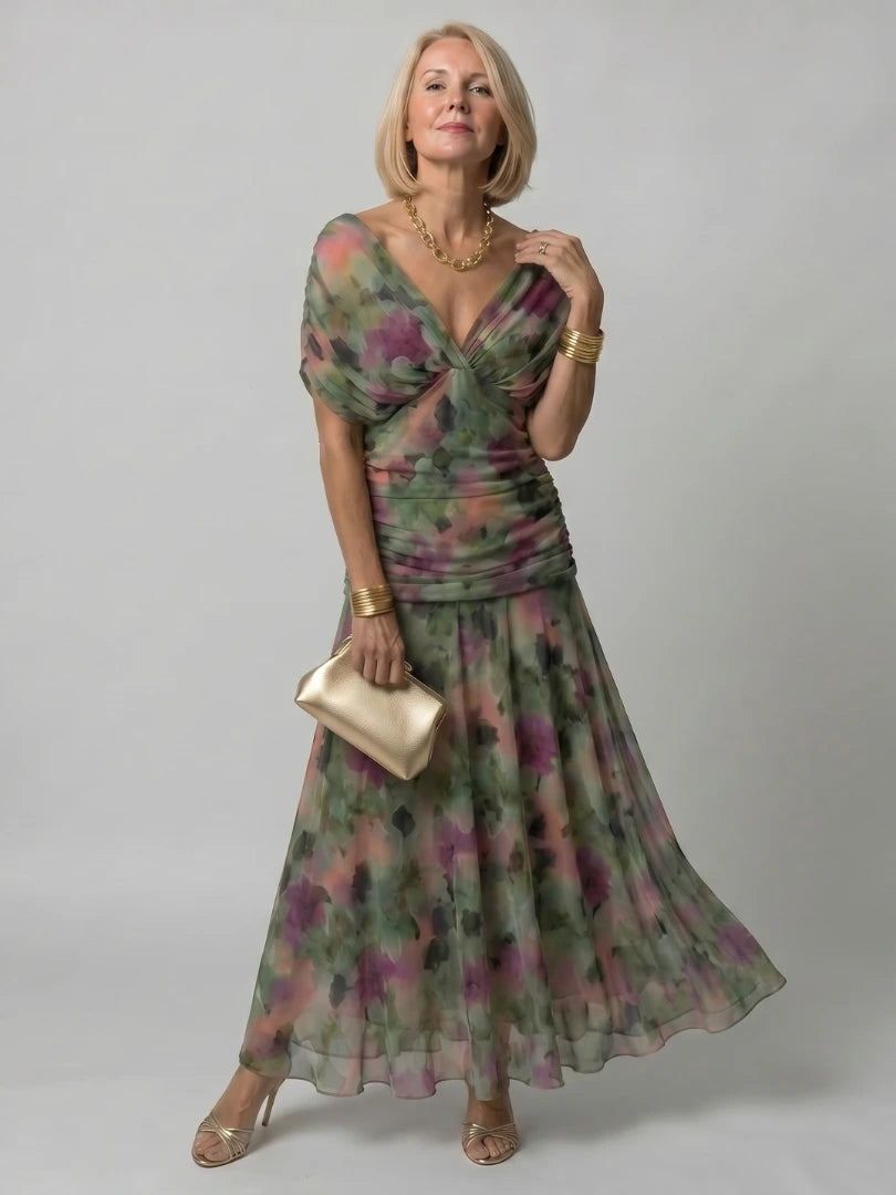 Woman wearing a brown off-shoulder draped midi dress - studio photo