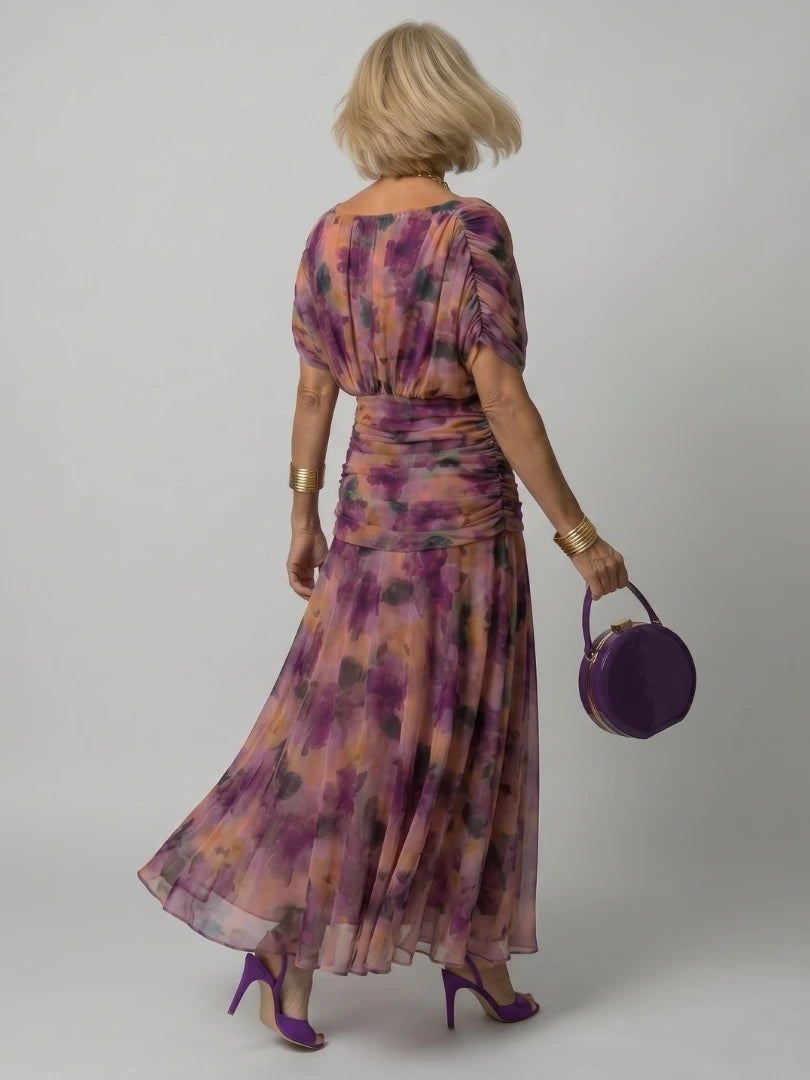 Woman wearing a purple off-shoulder draped midi dress - editorial style photo