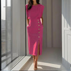 Woman wearing a hot pink side button midi split hem dress - lifestyle photo