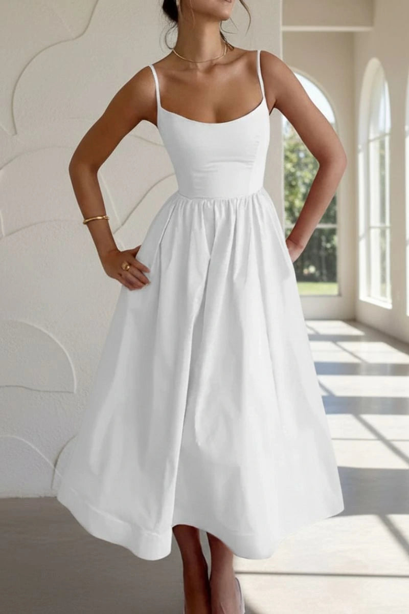 Woman wearing a white sleeveless cocktail midi dress - outdoor lifestyle photo