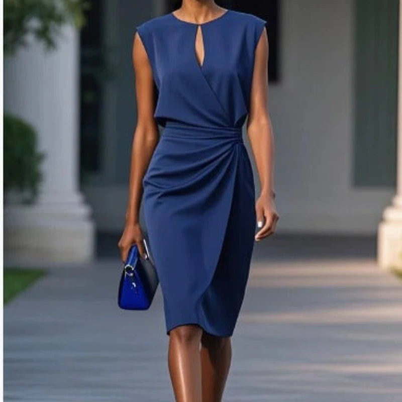 Woman wearing a dark blue sleeveless elegant midi dress - lifestyle photo