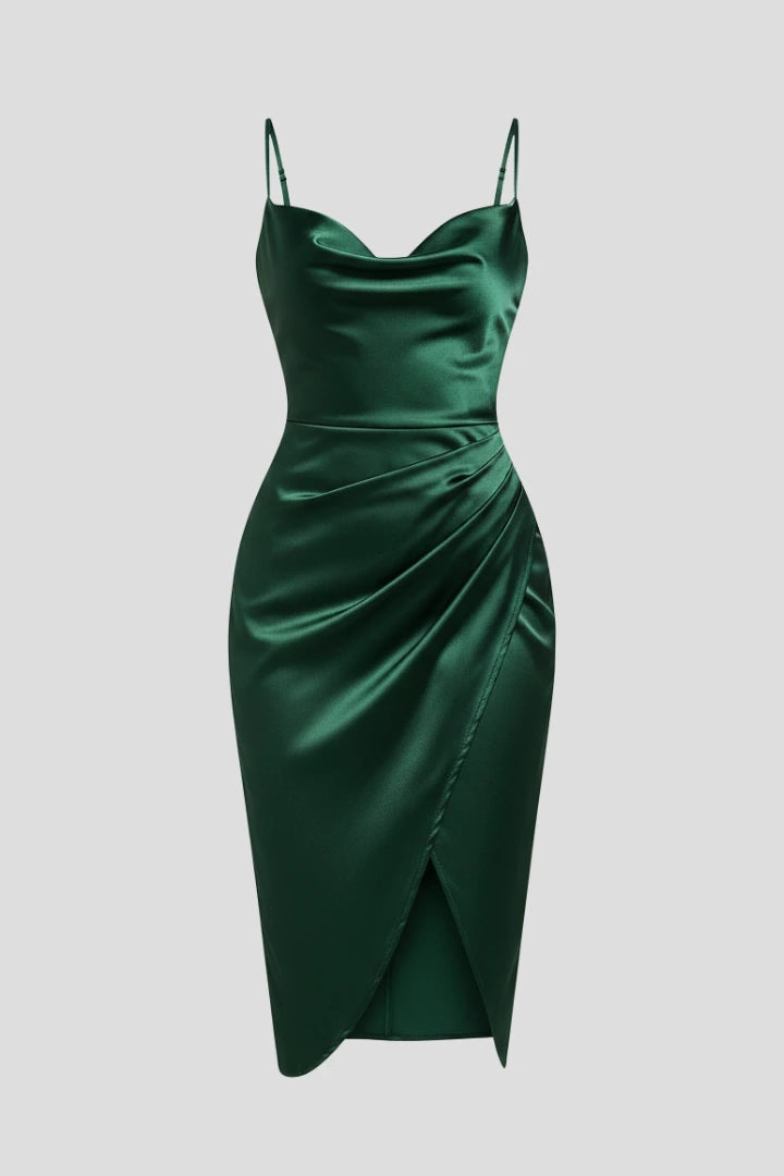 Woman wearing a green slim strap draped dress - studio photo