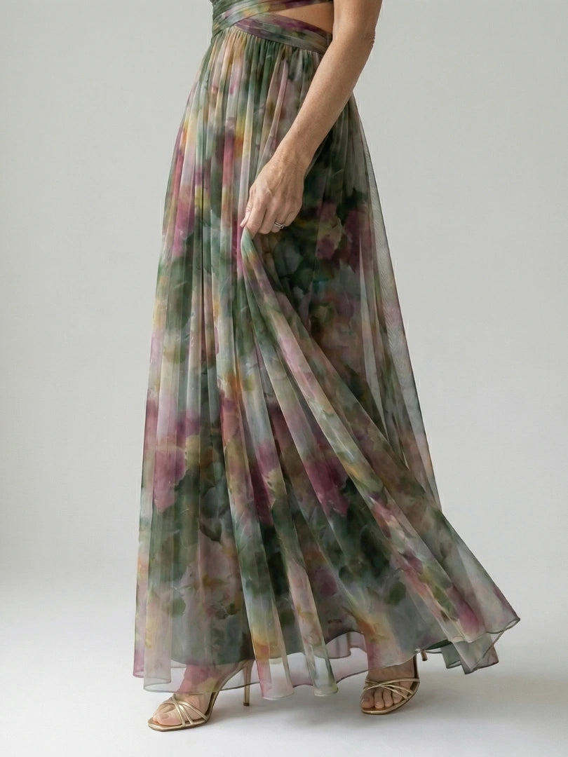 Woman wearing a dark green soft wrap maxi dress - studio photo