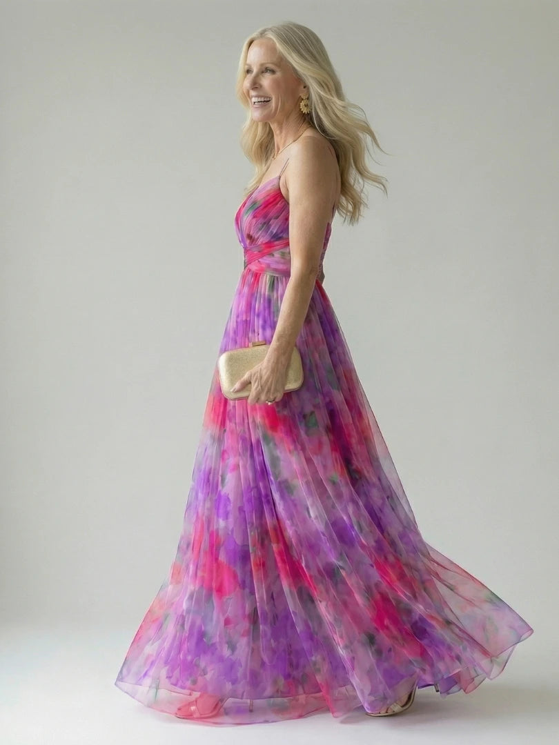 Woman wearing a pink soft wrap maxi dress - editorial style photo