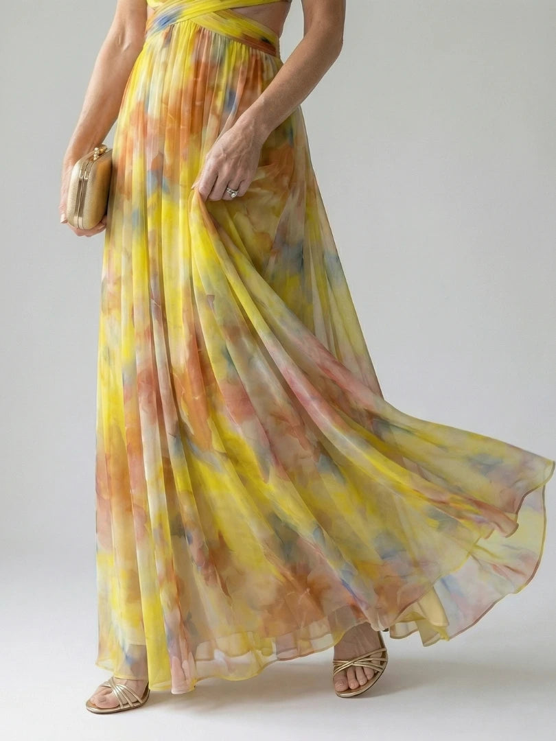 Woman wearing a yellow soft wrap maxi dress - editorial style photo