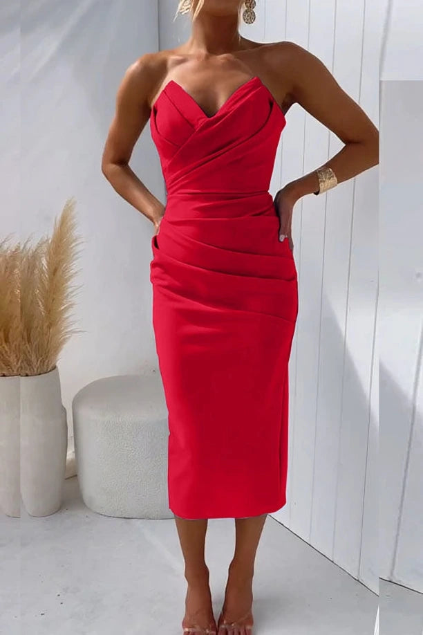 Woman wearing a red solid cocktail midi dress - studio photo