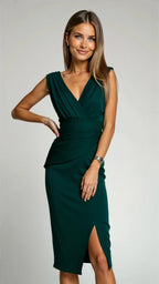 Woman wearing a green solid midi dress - studio photo