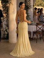 Woman wearing a black spaghetti strap corset maxi dress - editorial style photo