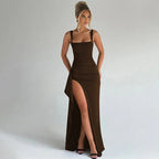 Woman wearing a brown square neck high slit maxi dress - studio photo