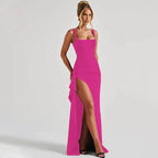 Woman wearing a pink square neck high slit maxi dress - studio photo