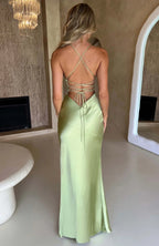 Woman wearing a sage thin strap high slit maxi dress - outdoor lifestyle photo