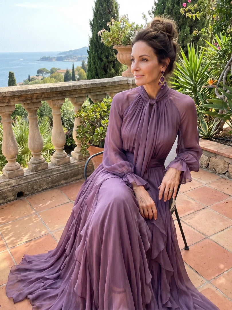 Woman wearing a purple tie neck ruffle tiered maxi dress - editorial style photo
